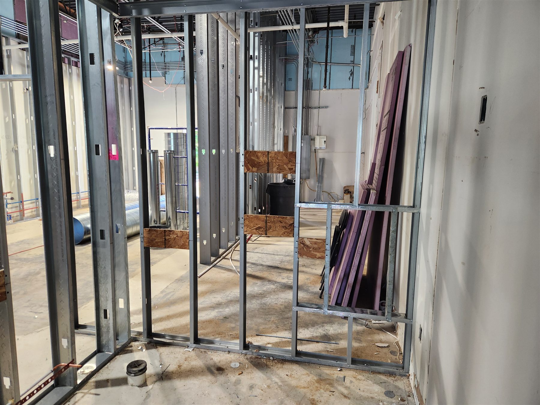Metal-stud framing on a commercial interior build